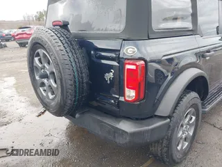 2021 Ford Bronco with VIN 1FMDE5BH8MLA83132, listed as a IAAI auction lot 41729825 with 31,192 mi miles and . Bid and sale history available at DreamBid. Image 6.