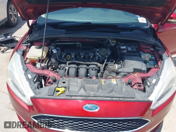2016 Ford Focus SE z VIN 1FADP3F28GL237888, wystawiony jako IAAI lot #42564140 z przebiegiem 143 210 mil mil oraz . Historia ofert i sprzedaży dostępna na DreamBid. Obrazek 10.