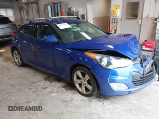 2014 Hyundai Veloster with VIN KMHTC6AD4EU196870, listed as a IAAI auction lot 41207663 with 119,252 mi miles. Bid and sale history available at carsss.com. Image 1.