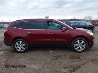 2016 Chevrolet Traverse LTZ z VIN 1GNKVJKD8GJ167038, wystawiony jako IAAI lot #41878254 z przebiegiem 159 771 mil mil oraz . Historia ofert i sprzedaży dostępna na DreamBid. Obrazek 13.