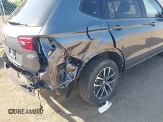 2021 Volkswagen Tiguan S with VIN 3VV0B7AX3MM038342, listed as a IAAI auction lot 42545665 with 66,809 mi miles and . Bid and sale history available at DreamBid. Image 6.