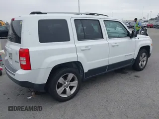 2014 Jeep Patriot Limited with VIN 1C4NJPCB2ED694389, listed as a IAAI auction lot 42028445 with 128,343 mi miles and . Bid and sale history available at DreamBid. Image 4.