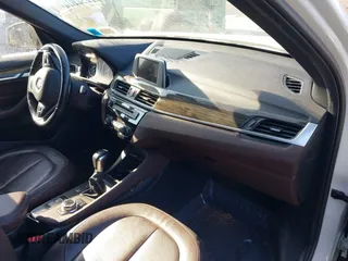 2017 BMW X1 xDrive28i with VIN WBXHT3Z36H4A52364, listed as a IAAI auction lot 41397667 with 61,960 mi miles. Bid and sale history available at carsss.com. Image 5.