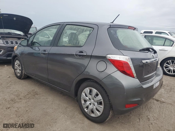 2014 Toyota Yaris L with VIN JTDKTUD32ED587183, listed as a Copart auction lot 75106764 with 0 mi miles and Salvage Title. Bid and sale history available at carsss.com. Image 2.
