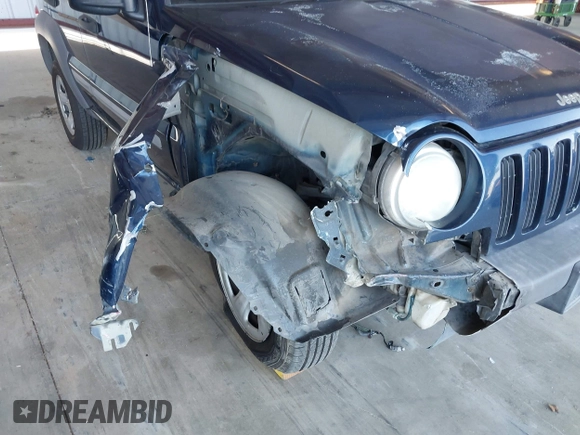 2002 Jeep Liberty Sport with VIN 1J4GL48K32W145174, listed as a IAAI auction lot 42028324 with 291,896 mi miles. Bid and sale history available at carsss.com. Image 6.