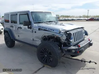 2015 Jeep Wrangler Unlimited Rubicon Hard Rock with VIN 1C4HJWFG6FL762537, listed as a IAAI auction lot 41792066 with 125,829 mi miles. Bid and sale history available at carsss.com. Image 1.