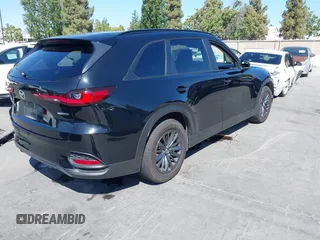 2025 Mazda CX-70 Preferred with VIN JM3KJBHD7S1115403, listed as a IAAI auction lot 42504874 with 21,747 mi miles and . Bid and sale history available at DreamBid. Image 4.