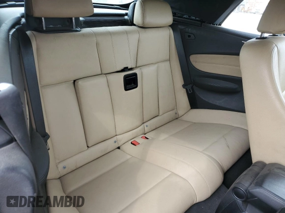 2009 BMW 1 Series 128i with VIN WBAUL73569VJ76363, listed as a Copart auction lot 52380635 with 210,519 mi miles and Salvage Title. Bid and sale history available at DreamBid. Image 10.