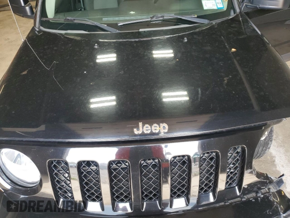 2014 Jeep Patriot Latitude with VIN 1C4NJPFB0ED890696, listed as a Copart auction lot 55581825 with 70,030 mi miles and Salvage title. Bid and sale history available at DreamBid. Image 12.