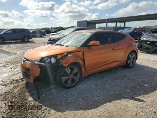 2016 Hyundai Veloster z VIN KMHTC6ADXGU285877, wystawiony jako Copart lot #55842615 z przebiegiem 92 969 mil mil oraz Szkody całkowita. Historia ofert i sprzedaży dostępna na DreamBid. Obrazek 1.