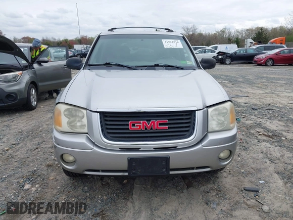 2004 GMC Envoy SLE with VIN 1GKDS13S142202004, listed as a IAAI auction lot 41921818 with 231,912 mi miles and . Bid and sale history available at DreamBid. Image 12.