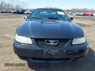 2000 Ford Mustang with VIN 1FAFP444XYF181018, listed as a IAAI auction lot 41943486 with 212,996 mi miles. Bid and sale history available at carsss.com. Image 12.