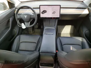 2021 Tesla Model Y Long Range z VIN 5YJYGDEE0MF263137, wystawiony jako Copart lot #57295705 z przebiegiem 63 627 mil mil oraz Szkoda całkowita • Salvage title. Historia ofert i sprzedaży dostępna na DreamBid. Obrazek 8.