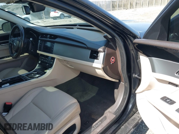 2017 Jaguar XF 35t Premium with VIN SAJBJ4BV2HCY37415, listed as a IAAI auction lot 41902754 with 93,275 mi miles and . Bid and sale history available at DreamBid. Image 5.