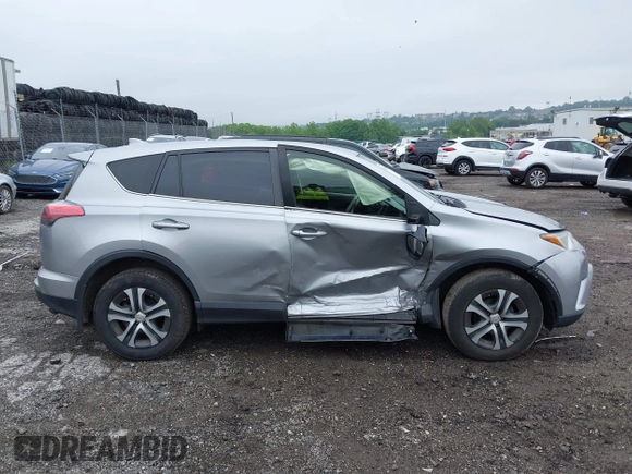 2018 Toyota RAV4 LE with VIN JTMBFREV8JJ200930, listed as a IAAI auction lot 42524876 with 88,015 mi miles and . Bid and sale history available at DreamBid. Image 14.