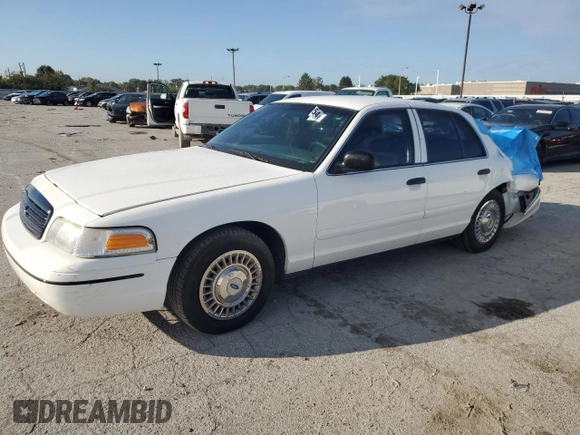 1999 Ford Crown Victoria Police z VIN 2FAFP71W7XX156457, wystawiony jako Copart lot #71623954 z przebiegiem 123 313 mil mil oraz Szkody całkowita. Historia ofert i sprzedaży dostępna na DreamBid. Obrazek 1.