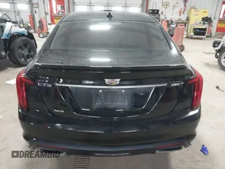 2021 Cadillac CT5 Luxury z VIN 1G6DX5RK0M0147667, wystawiony jako IAAI lot #41398726 z przebiegiem 50 387 mil mil oraz . Historia ofert i sprzedaży dostępna na DreamBid. Obrazek 16.