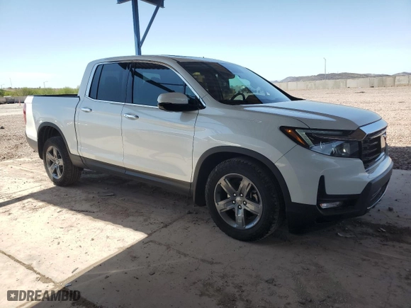 2022 Honda Ridgeline RTL-E with VIN 5FPYK3F76NB015489, listed as a Copart auction lot 52457795 with 35,730 mi miles and Salvage Title. Bid and sale history available at carsss.com. Image 4.