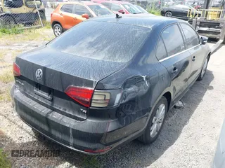 2016 Volkswagen Jetta Sedan 1.4T SE with VIN 3VWD67AJ3GM316965, listed as a IAAI auction lot 41919181 with 73,723 mi miles. Bid and sale history available at carsss.com. Image 4.