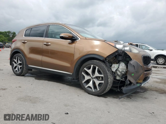 2017 Kia Sportage SX Turbo with VIN KNDPR3A66H7203597, listed as a Copart auction lot 54489895 with 121,997 mi miles and Salvage title. Bid and sale history available at DreamBid. Image 4.