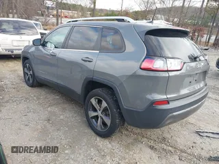 2020 Jeep Cherokee Limited with VIN 1C4PJLDBXLD502858, listed as a IAAI auction lot 41148184 with 73,509 mi miles. Bid and sale history available at carsss.com. Image 3.