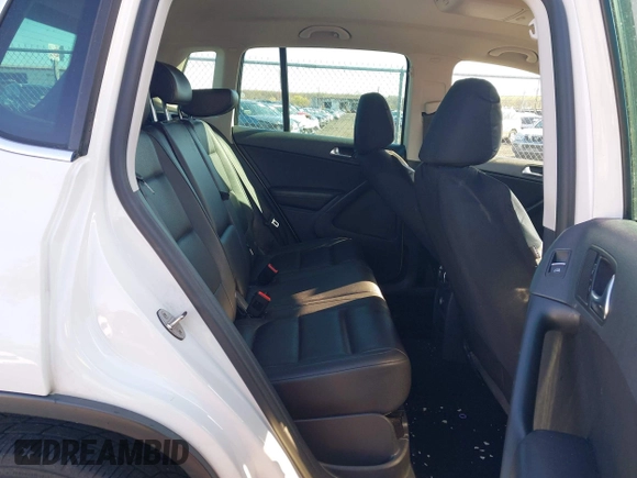 2013 Volkswagen Tiguan SE with VIN WVGBV7AX7DW511699, listed as a IAAI auction lot 41970908 with 164,758 mi miles and . Bid and sale history available at DreamBid. Image 8.