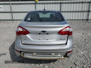 2016 Ford Fiesta SE z VIN 3FADP4BJ3GM142298, wystawiony jako Copart lot #54320835 z przebiegiem 144 636 mil mil oraz Szkoda całkowita • Salvage title. Historia ofert i sprzedaży dostępna na DreamBid. Obrazek 6.