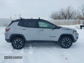 2020 Jeep Compass Trailhawk with VIN 3C4NJDDB1LT203329, listed as a IAAI auction lot 41301931 with 79,035 mi miles and . Bid and sale history available at carsss.com. Image 13.