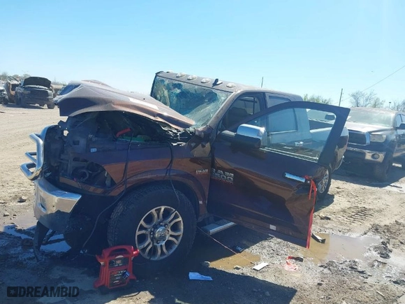 2015 Ram 2500 Laramie with VIN 3C6UR5NJ4FG647003, listed as a IAAI auction lot 41706733 with 115,764 mi miles. Bid and sale history available at carsss.com. Image 2.