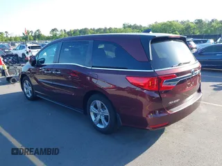 2019 Honda Odyssey EX z VIN 5FNRL6H5XKB125738, wystawiony jako IAAI lot #42019210 z przebiegiem 68 700 mil mil oraz . Historia ofert i sprzedaży dostępna na DreamBid. Obrazek 3.