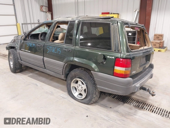 1997 Jeep Grand Cherokee Laredo z VIN 1J4GZ58YXVC729117, wystawiony jako IAAI lot #42244799 z przebiegiem Nie podano mil oraz . Historia ofert i sprzedaży dostępna na DreamBid. Obrazek 3.