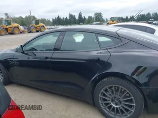 2021 Tesla Model S Plaid with VIN 5YJSA1E62MF447509, listed as a IAAI auction lot 42509281 with 32,372 mi miles and . Bid and sale history available at DreamBid. Image 15.