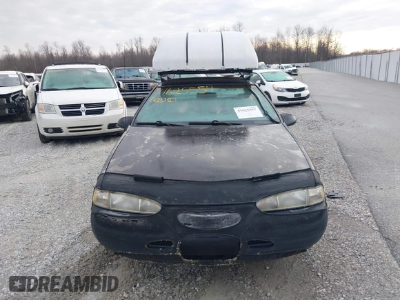 1997 Ford Thunderbird LX z VIN 1FALP62W9VH102330, wystawiony jako IAAI lot #41625557 z przebiegiem 48 826 mil mil oraz . Historia ofert i sprzedaży dostępna na DreamBid. Obrazek 6.