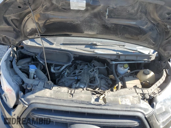 2020 Ford Transit with VIN 1FTBR3XG6LKB75297, listed as a Copart auction lot 74252794 with 82,771 mi miles and Salvage Title. Bid and sale history available at DreamBid. Image 12.