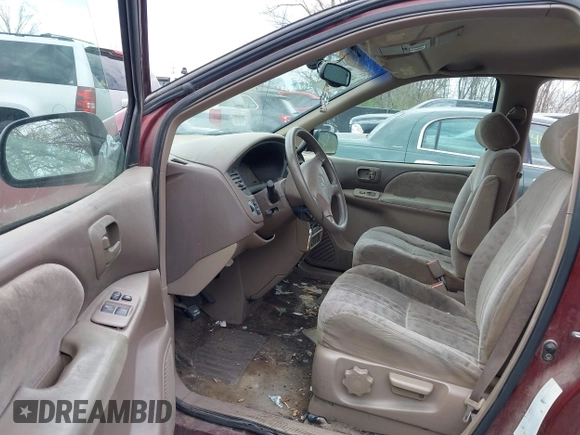 2001 Toyota Sienna LE with VIN 4T3ZF13C71U345315, listed as a IAAI auction lot 41887275 with 253,432 mi miles. Bid and sale history available at carsss.com. Image 5.