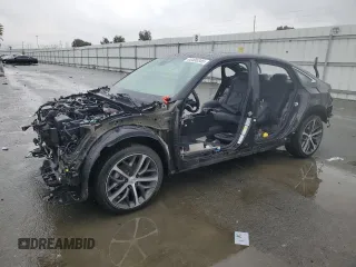2023 Honda Civic Touring z VIN 2HGFE1F97PH302593, wystawiony jako Copart lot #44405345 z przebiegiem Nie podano mil oraz Szkoda całkowita • Salvage title. Historia ofert i sprzedaży dostępna na DreamBid. Obrazek 1.