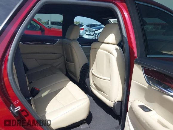 2017 Cadillac XT5 Luxury FWD with VIN 1GYKNBRS4HZ216364, listed as a IAAI auction lot 41877671 with 83,931 mi miles and . Bid and sale history available at DreamBid. Image 8.
