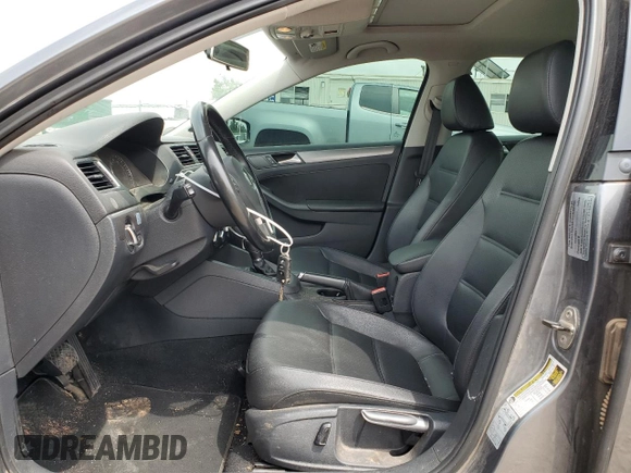 2014 Volkswagen Jetta TDI w/Premium with VIN 3VWLL7AJ7EM313598, listed as a Copart auction lot 54905595 with 162,036 mi miles and Salvage title. Bid and sale history available at DreamBid. Image 7.