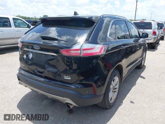 2020 Ford Edge SEL with VIN 2FMPK3J99LBA59621, listed as a IAAI auction lot 42513247 with 163,466 mi miles and . Bid and sale history available at DreamBid. Image 4.