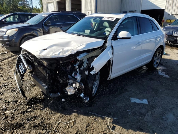 2015 Audi Q3 Premium Plus with VIN WA1BFCFS7FR014199, listed as a Copart auction lot 81987154 with 62,071 mi miles and Salvage title. Bid and sale history available at DreamBid. Image 1.