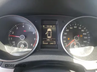 2014 Volkswagen Golf с VIN WVWDB7AJ7EW001565, выставлен на аукционе Copart как лот 67418224 с пробегом 70 169 миль миль и Списание • Salvage title. История ставок и продаж доступна на DreamBid. Изображение 9.