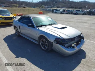 2004 Ford Mustang GT Deluxe z VIN 1FAFP45X54F189319, wystawiony jako IAAI lot #41709599 z przebiegiem Nie podano mil oraz . Historia ofert i sprzedaży dostępna na DreamBid. Obrazek 1.