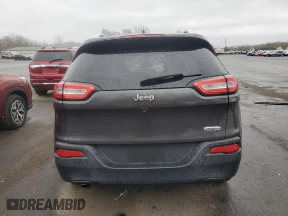 2015 Jeep Cherokee Latitude with VIN 1C4PJLCB9FW560566, listed as a Copart auction lot 51741275 with Not Provided miles and Salvage Title. Bid and sale history available at DreamBid. Image 6.