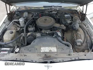 1990 Chevrolet Caprice z VIN 1G1BU54E9LA105479, wystawiony jako IAAI lot #42277687 z przebiegiem 30 947 mil mil oraz . Historia ofert i sprzedaży dostępna na DreamBid. Obrazek 10.