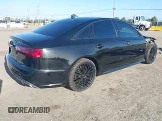 2016 Audi A6 3.0T Premium Plus with VIN WAUFGAFC2GN001285, listed as a IAAI auction lot 41938989 with 119,687 mi miles. Bid and sale history available at carsss.com. Image 4.