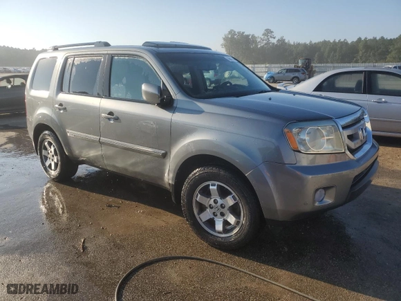 2009 Honda Pilot Touring with VIN 5FNYF388X9B012023, listed as a Copart auction lot 74843174 with 221,210 mi miles and Salvage Title. Bid and sale history available at carsss.com. Image 4.