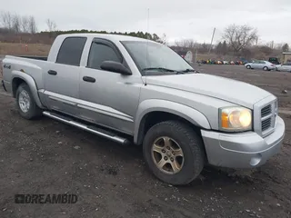 2006 Dodge Dakota SLT with VIN 1D7HW48N76S639553, listed as a IAAI auction lot 41810258 with 140,745 mi miles. Bid and sale history available at carsss.com. Image 1.