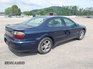 2002 Pontiac Bonneville SLE z VIN 1G2HY54K524175736, wystawiony jako IAAI lot #42730873 z przebiegiem 115 308 mil mil oraz . Historia ofert i sprzedaży dostępna na DreamBid. Obrazek 4.