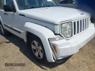 2012 Jeep Liberty Sport z VIN 1C4PJMAK7CW209305, wystawiony jako IAAI lot #42105378 z przebiegiem 136 617 mil mil oraz . Historia ofert i sprzedaży dostępna na DreamBid. Obrazek 6.