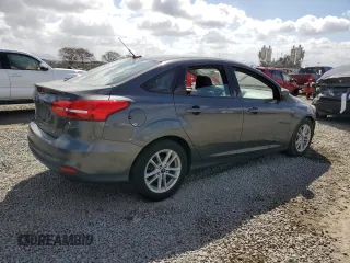 2018 Ford Focus SE with VIN 1FADP3F24JL231626, listed as a Copart auction lot 51015275 with 97,054 mi miles and Salvage Title. Bid and sale history available at carsss.com. Image 3.